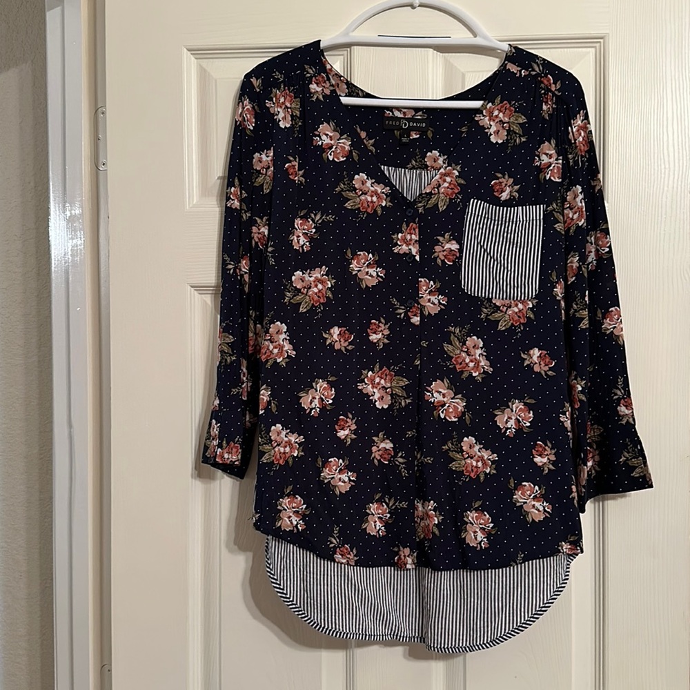 Navy with white stripes & Navy with pink flowered print it 3/4 length sleeve.